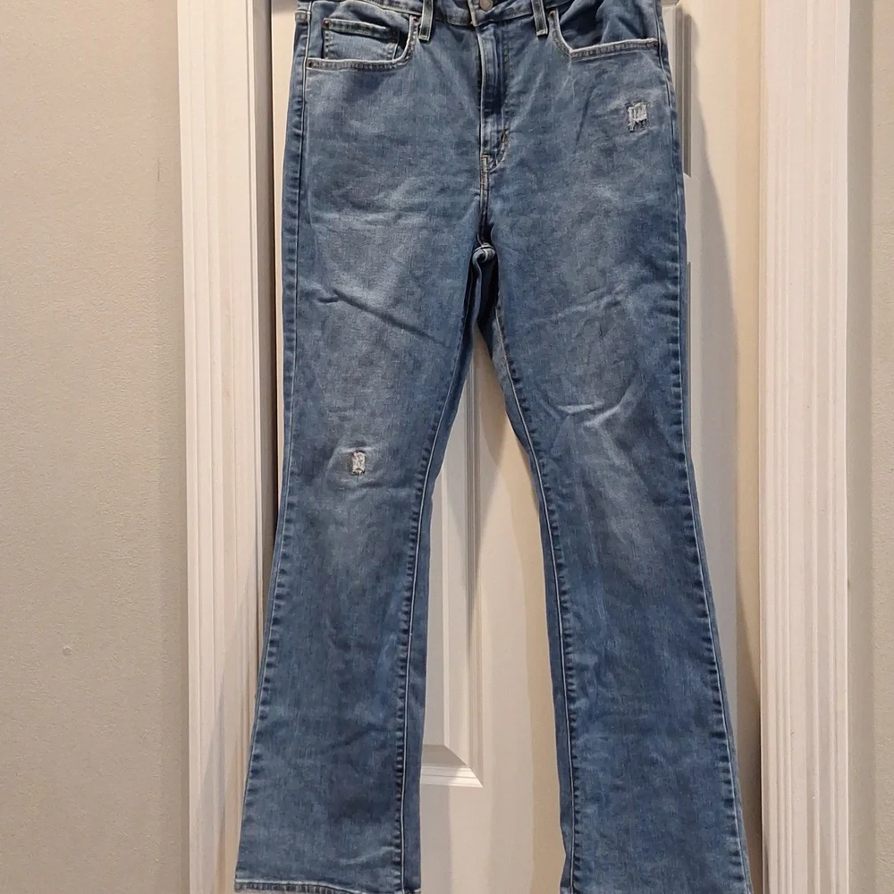 Levis 725 Medium Wash High Rise Bootcut Flare Sz 33 XL Stretch Distressing‎